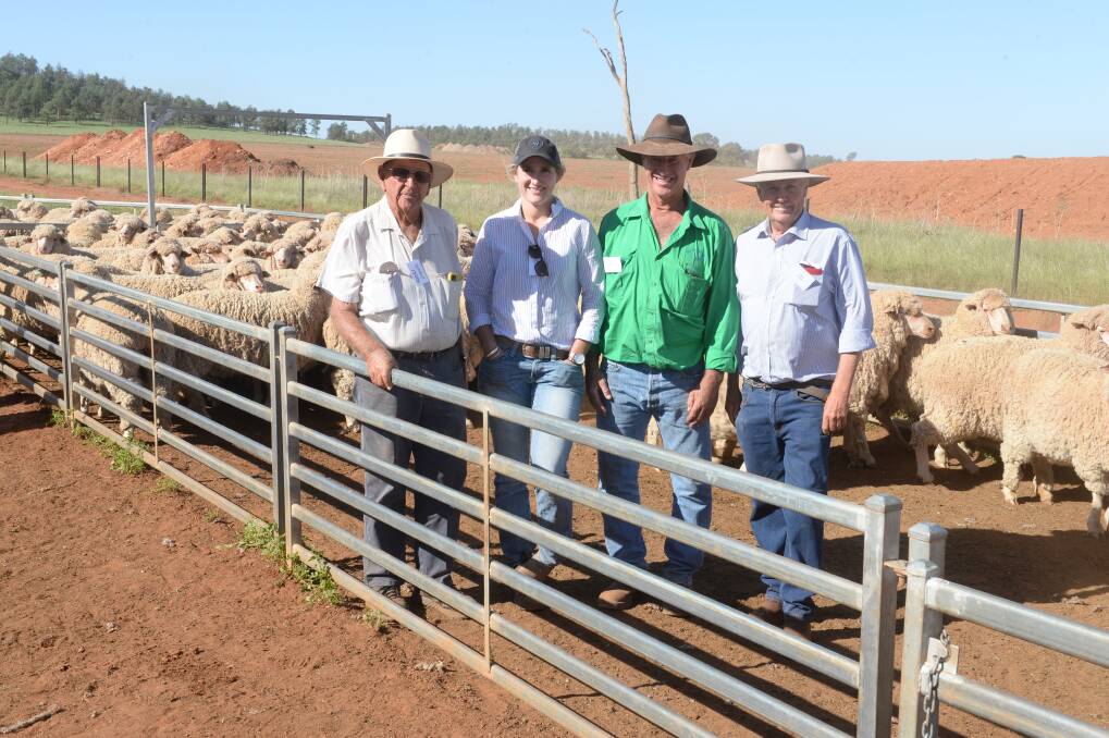 Back in the winners circle, Karu Pastoral maiden ewes won the 2021 fixture. Pictured is Harold, Meg and Phillip Crouch with classer Chris Bowman among their homebred sired maidens displayed at Big Weebah, Condobolin.