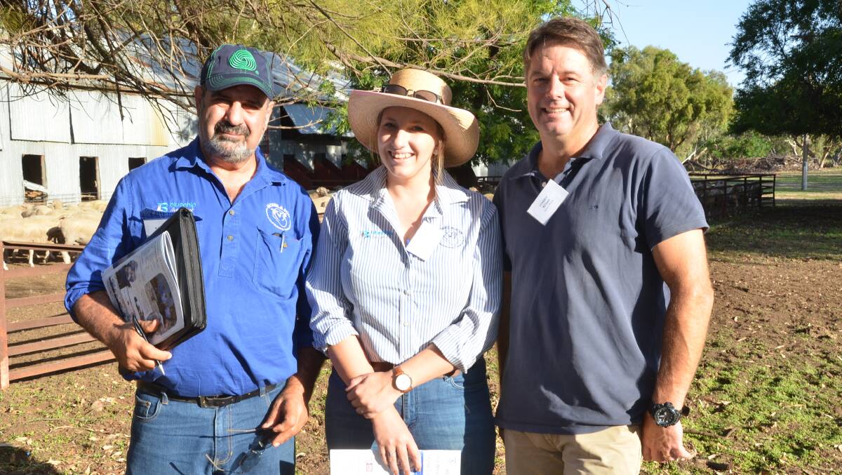 Marty Moses and Veronike Hartmeier of Moses and Son Woolbrokers, Temora, with Harry Wilson, Dynon Wools.