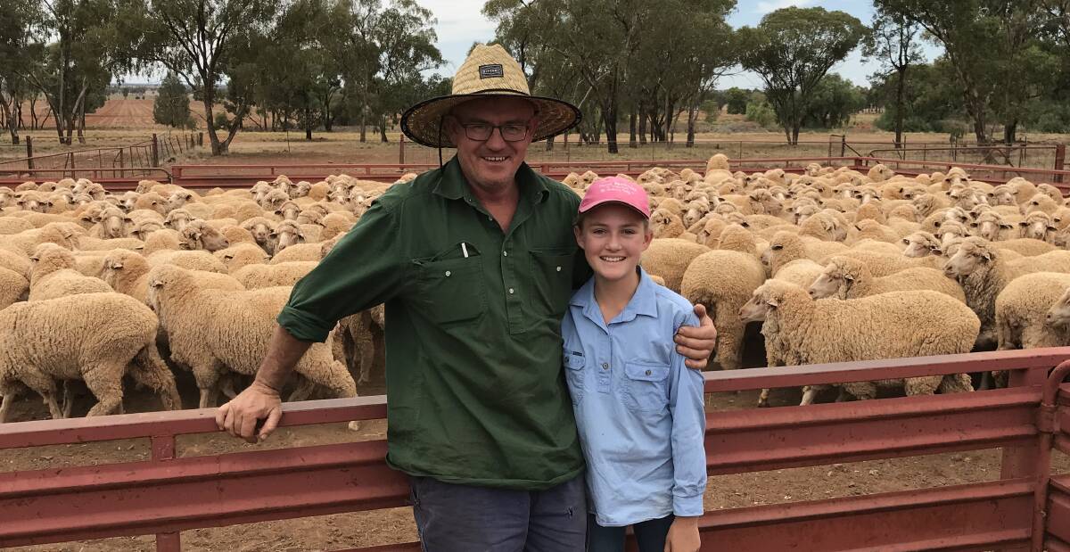LAKE CARGELLIGO WINNER: Justin McCarten and daughter, Molly, with their 19.8 micron One Oak blood ewes at "Glen Echo", Erigolia near Rankins Springs and classed by Michael Elmes, Narrandera.  