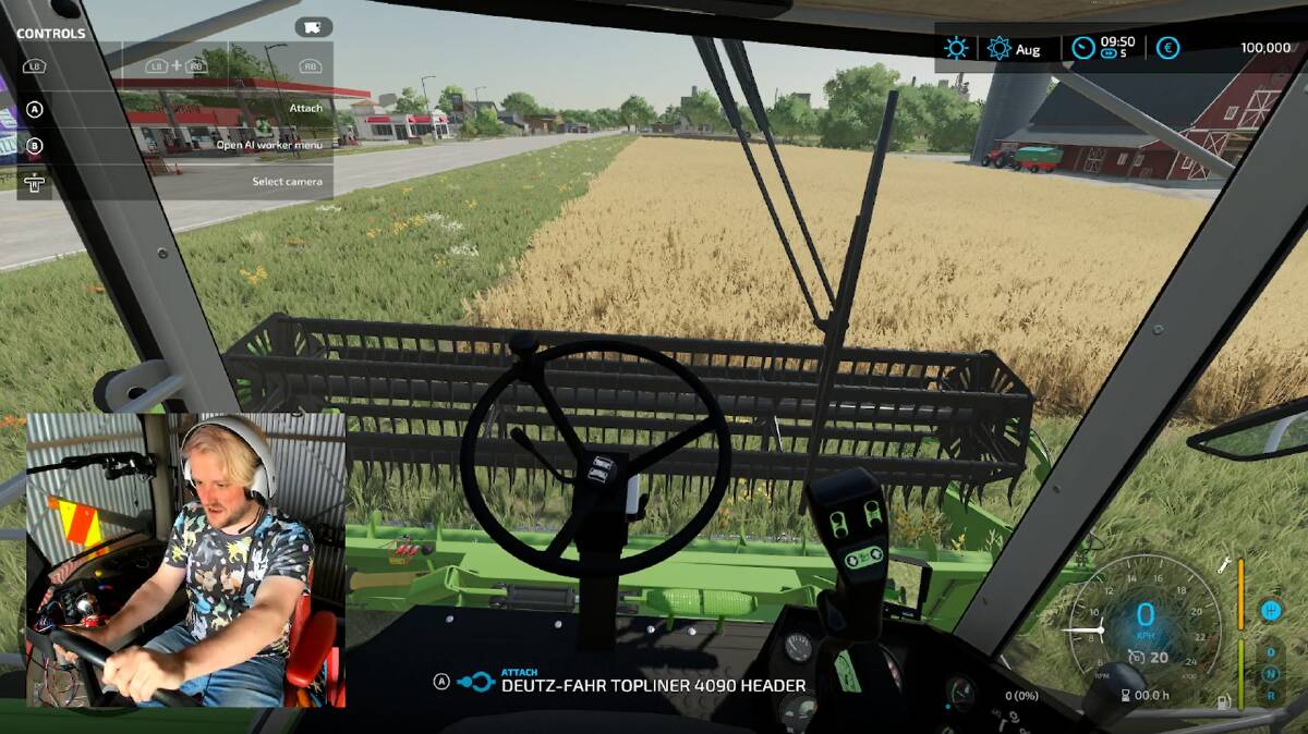 PLAYER: Dylan Beck at the helm of a header, controlling from a real-life tractor he converted into a game controller. 