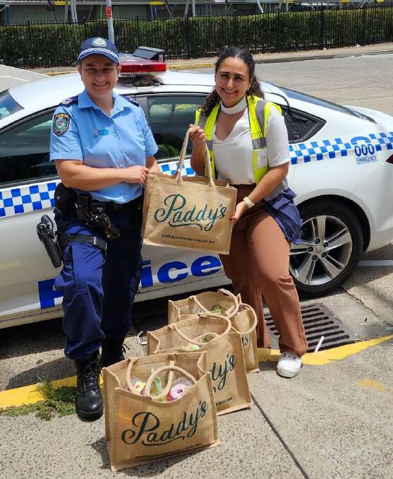 (L-R): Auburn Police senior constable Gabriella Di Marino with Sydney Markets Isabella Carabetta, ready to hand out the donated hampers. Picture supplied