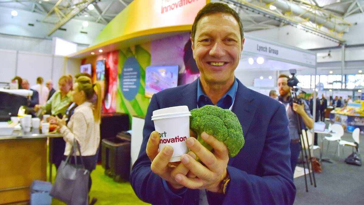 HEALTHY CUP: Broccoli grower and managing director of Fresh Select, John Said, with a broccoli latte at the Hort Innovation stand during Hort Connections 2018.
