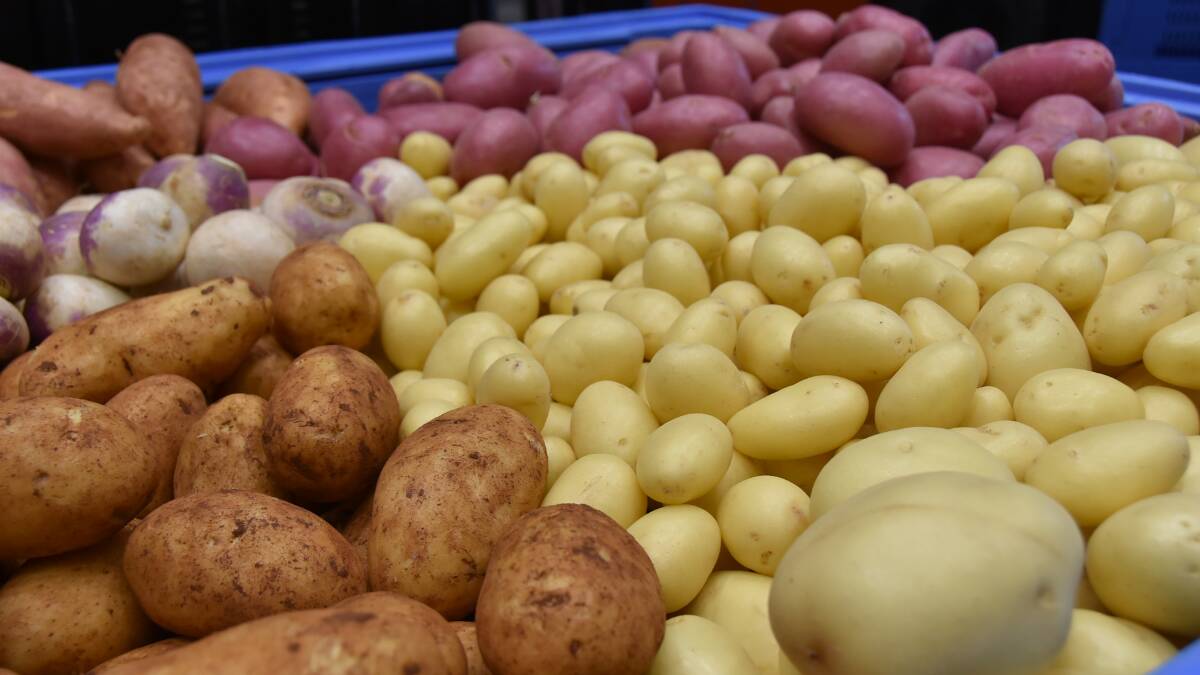 PLENTY: Australias vegetable producers grew enough potatoes to fill the Melbourne Cricket Ground last year. 