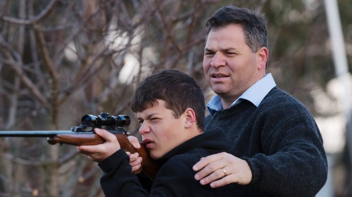 Shooters, Fishers and Farmers Party member, Phil Donato with 13-year-old son Sean on their property outside Orange. Photo: James Brickwood