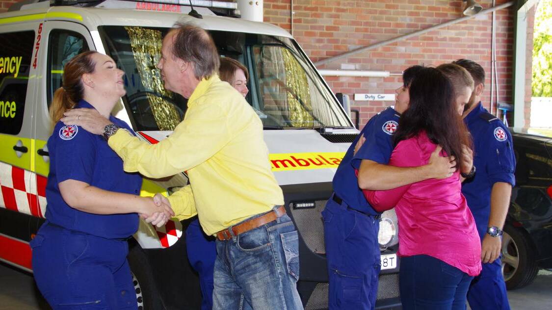 The Martins thanks the paramedics at Goulburn Ambulance Station on February 10.