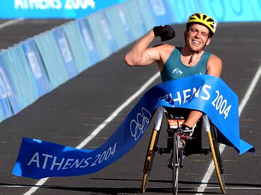 CHAMPION: Kurt Fearnley winning one of his three Paralympic gold medals, this one at Athens in 2004.