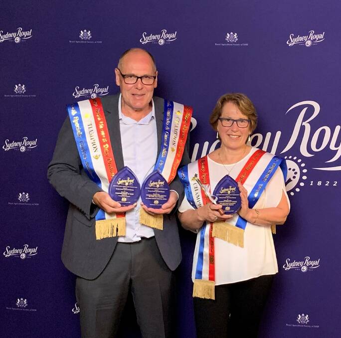 WINNERS: Barry and Cheryl Charlton proudly display the trophies won by Berrys Creek Gourmet Cheese at this year's Royal Agricultural Society of NSW (RAS) Sydney Royal Cheese and Dairy Produce Show.