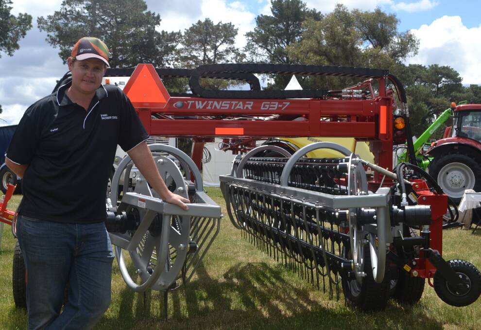 Forbes Machinery Centre's Peter Nixon with the Twinstar G3 hay rake which was a big hit with visitors at the Australian National Field Days.
