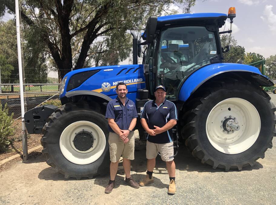 Temora Truck and Tractor's branch manager Tom Harvey with incoming owner David Thompson.