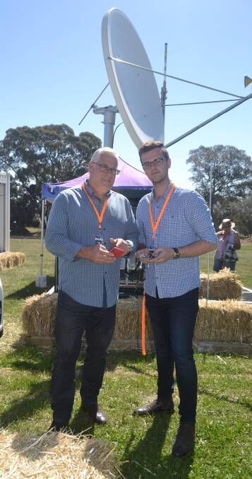 Telstra's Michael Marom and Joshua Fulwood were happy to promote what the communications company is achieving in rural and regional Australia. 