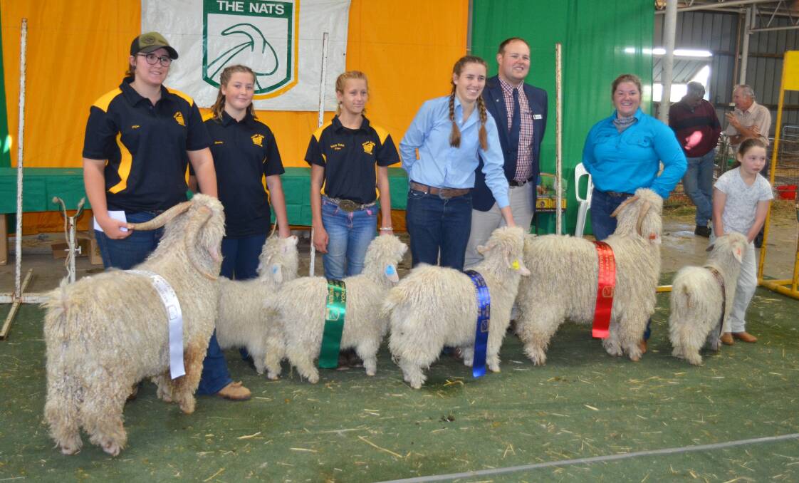 LEARNING: Students and Michael Mrowka (associate judge) lined up after the winners of the Youth Parading competition.