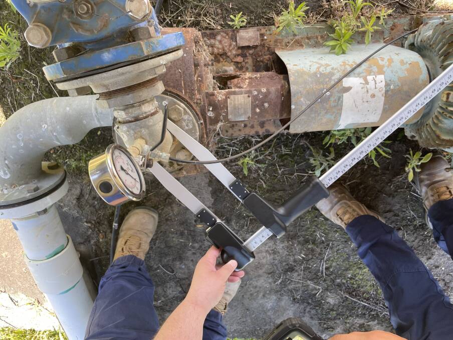 NRAR staff measuring a pump outlet as part of its on-property inspections. Picture supplied