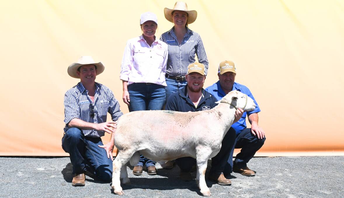 With the top selling ram are Burrawang Dorper and White Dorper stud's Nathan Morris, Dust N Rain Dorper stud's Stacey Cullinan, Burrawang's Grace Hadley, and Dust N Rain's Thomas and Gary Cullinan. Pictures by Denis Howard 