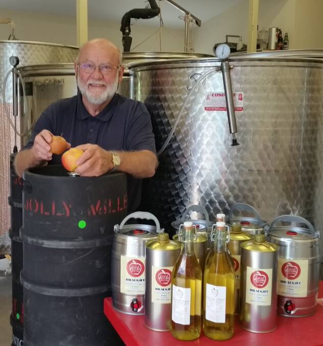 CRUSHING IT: Jolly Miller Apple Cider creator Ron Miller creates a clean, crisp cider in the shed of his Gundaroo, NSW, property. Photo: Sue Burns.