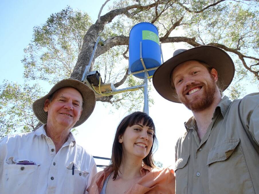 EXCITED: Robert Frend, Dr Valentina Mella, and Elliot Webb check out the installation of a Tree Troff. 