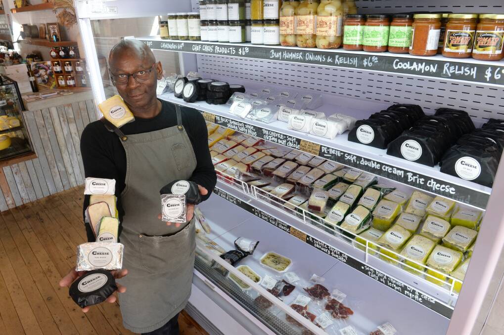 GREAT SELECTION: Coolamon Cheese waiter Carlton Carter with a range of cheeses in the deli. Photo: Rachel Webb.
