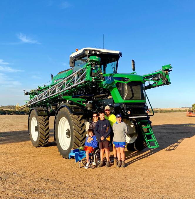 The Greive family, Cuballing, Western Australia, with their first self-propelled sprayer, a Goldacres G4 Crop Cruiser.