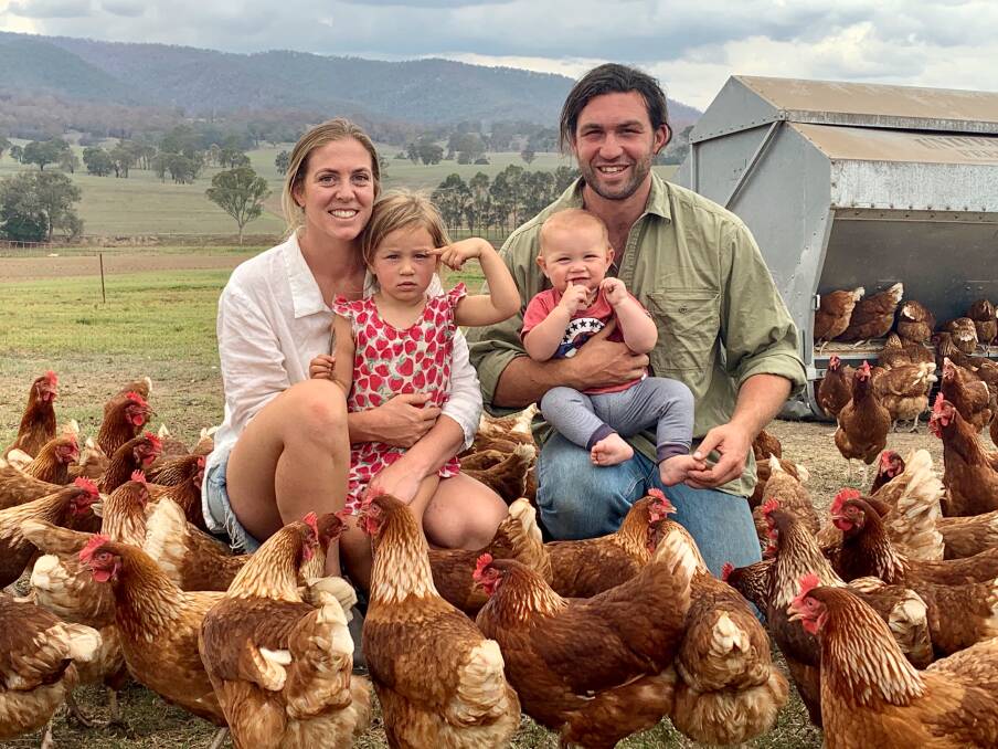 HELPING HANDS: Joscelin and Tom McMillan, pictured here with their children Amahli and Koa, have raised more than $50000 to help rebuild their two farms and assist their community.