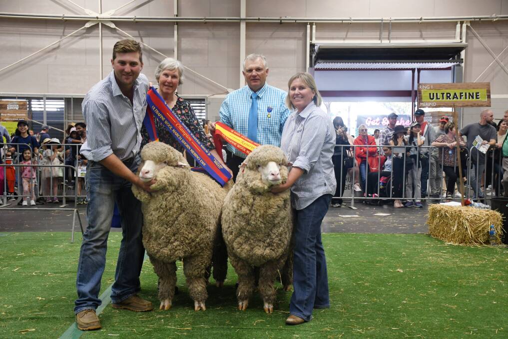 Champion and reserve March shorn ewes, both exhibited by Shalimar Park Merino Stud, Walcha, with owners Jack and Jane Carlon, presented by Alison Van Eyk and judge Philip Carlon. Picture by Clare Adcock