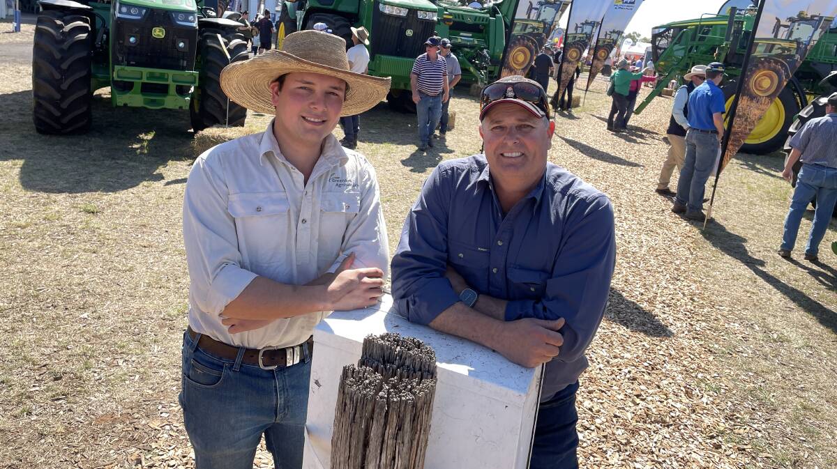 William and Gavin Bartel, Bartel Farming, Moree, took in the sights at the John Deere stand. Fifty years ago, Mr Bartel was photographed with his sister at the John Deere stand on toy tractors. "Things have certainly changed since then," he said.