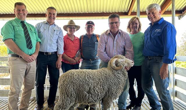 Hillcreston Park's top-priced ram with Ric Power, Nutrien auctioneer, AWN agent Mark Hedley, purchasers Kerry and Brendan Cole, Turon Hill, between Bathurst and Mudgee, with stud manager Frank Wicks, and owners Megan and Danny Picker.