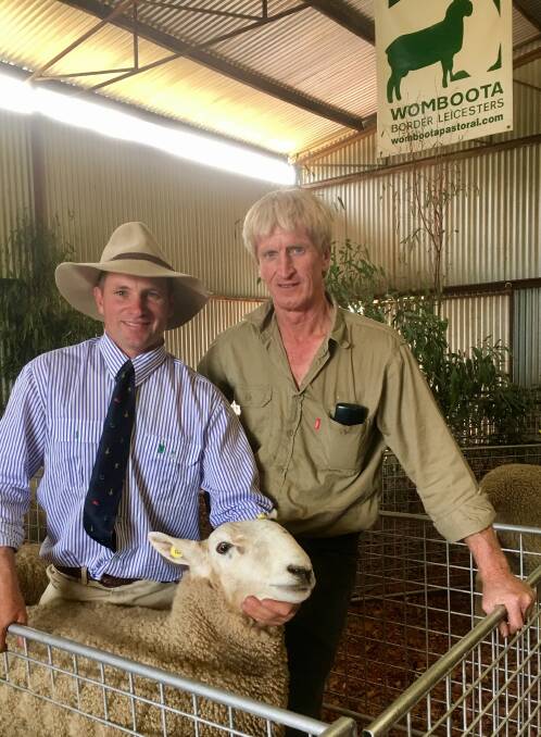 Malcolm Starritt, Womboota Pastoral, with Mick Griffin, Lake Rowan, who paid $2600 for the top priced ram at last Thursday's on property sale.