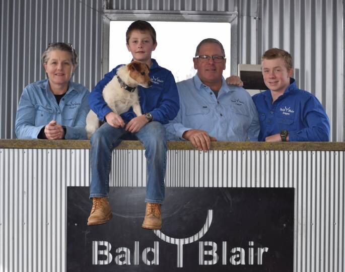 Focused on soil health: Producers Sam and Kirsty White and their sons, Arthur and Abbott and the family Jack Russell. 