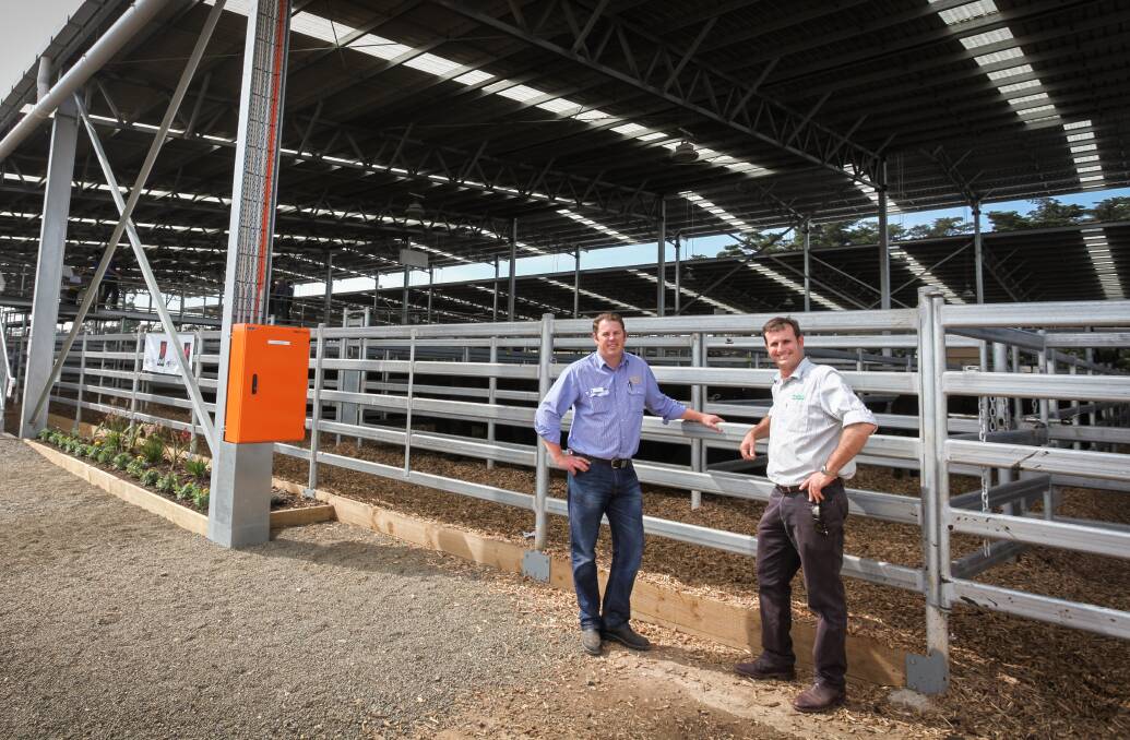 BUILT TO LAST: Victoria Livestock Exchange managing director Wayne Osbourne and ProWay director Bill Thomas at the launch of the East Gippsland Livestock Exchange designed and manufactured by ProWay.
