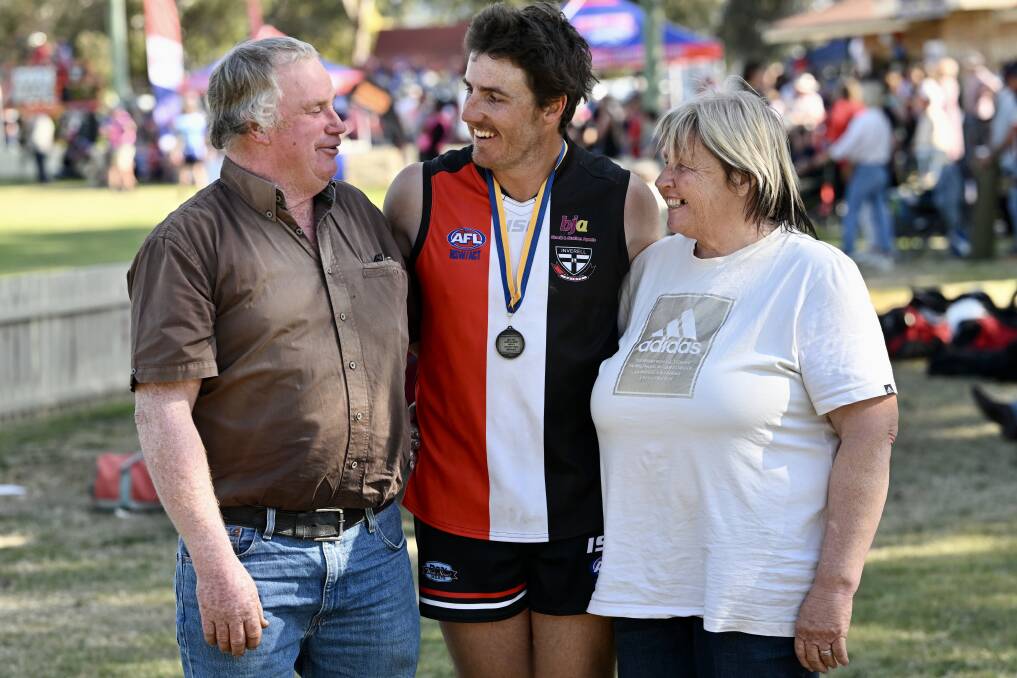 Saints captain Hayden Chappel is joined by his parents, Ian and Jill, after the side's grand final defeat of the Swans at Wolseley Oval on Saturday, August 26. Picture by Gareth Gardner