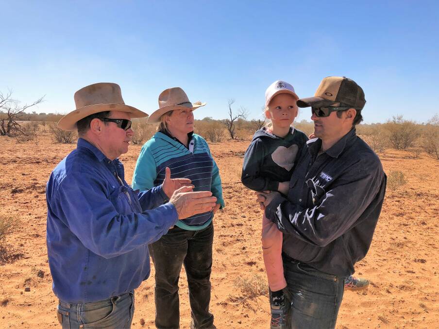 FAMILY AFFAIR: Donny and Colleen Costello, Crown Point Pastoral Company, with son-in-law, Ben Brooks, and grand daughter, Bailey, in the heart of their beef cattle operation south of Alice Springs based heavily on Angus genetics.      