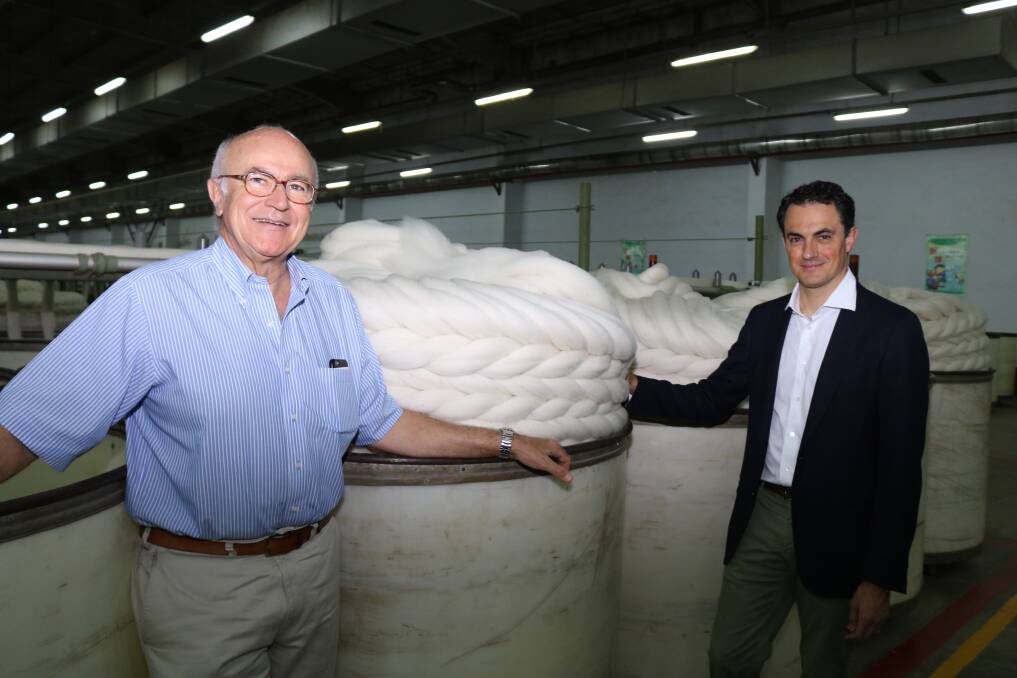 BREAK THE SHACKLES: Giovanni Schneider (pictured at right with his father, Marco) says wool is a traditional industry which needs to change to meet modern challenges.