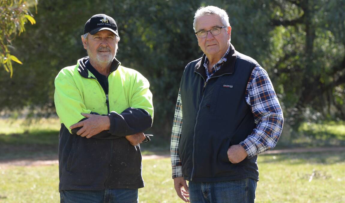 BROTHERS IN ARMS: Trevor and Neil Munro operate M.W. Munro and Sons, a livestock and cropping business near Coolamon, with Trevor's son, "Drew". 