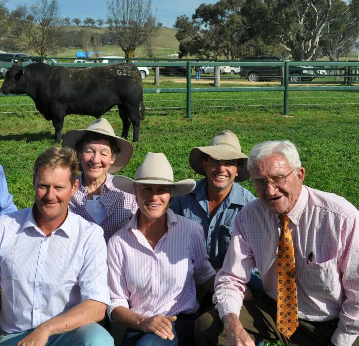 The late Wyatt Thompson (far right) after another successful Millah Murrah stud sale. His son, Ross, is on far left. 
