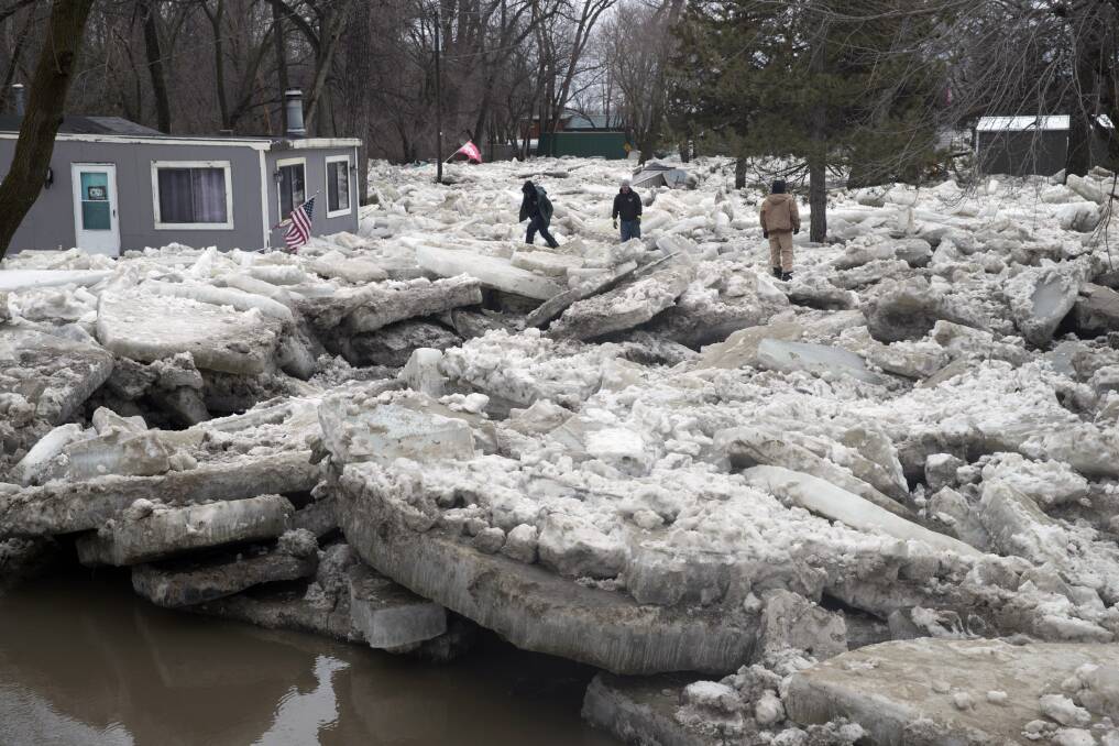 Huge chunks of ice have been pushed out of rivers in Nebraska and Iowa into villages and farms. Photo: Jeff Bundy/Omaha World-Herald via AP  