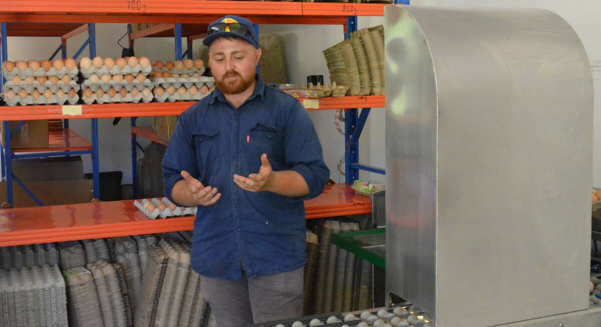 Troy Blackman in the egg packing shed on "Waterfall', one of his three farms at Upper Orara west of Coffs Harbour.     