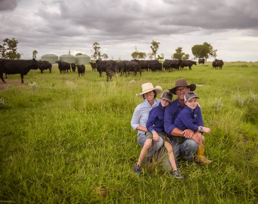 Julie and Jeremy Shaw with their sons, Leo and Henry, with Angus breeders on their property at Injune, Queensland. Picture by KELLY BUTTERWORTH.   