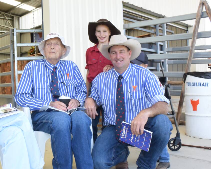 Auctioneer Innes Fahey and his sons Wroxton and Logan at the annual Yulgilbar Santa Gertrudis sale pictured with station owner recently deceased, Baillieau Myer. 