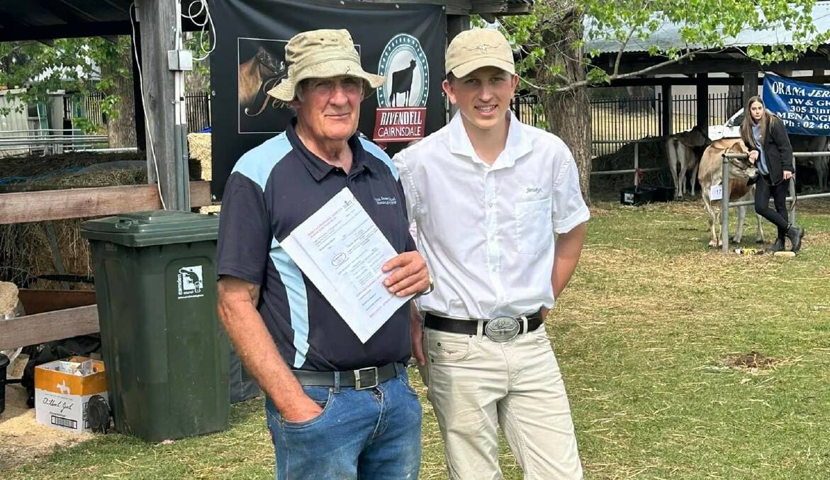 Dr John Quin, Orana Jerseys, with champion junior dairy judge Macs Rubain. Dr Quin's mentorship has helped many young people further their career in agriculture since the immunologist began showing the Jersey breed in 1984.