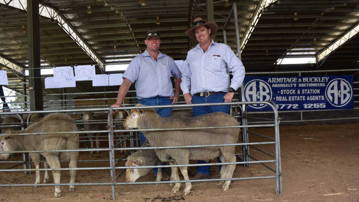 Volume buyers the White family partnership, “Alvaholme”, Narromine, purchased six Dohne rams to $2600. Harewood Dohne stud principal Justin Tombs is pictured with Patrick White.