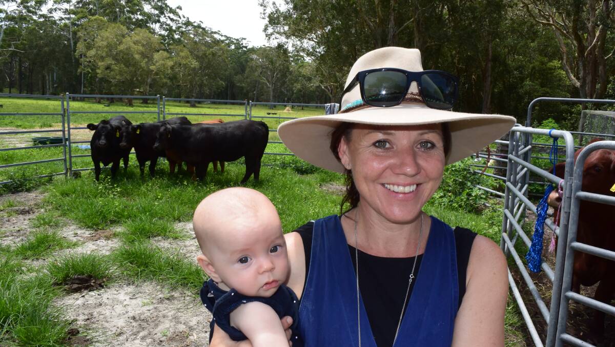 Macleay Valley veterinarian Heather Walker and baby Holly, four months. Juggling family and practice is a pleasure for this busy mum.