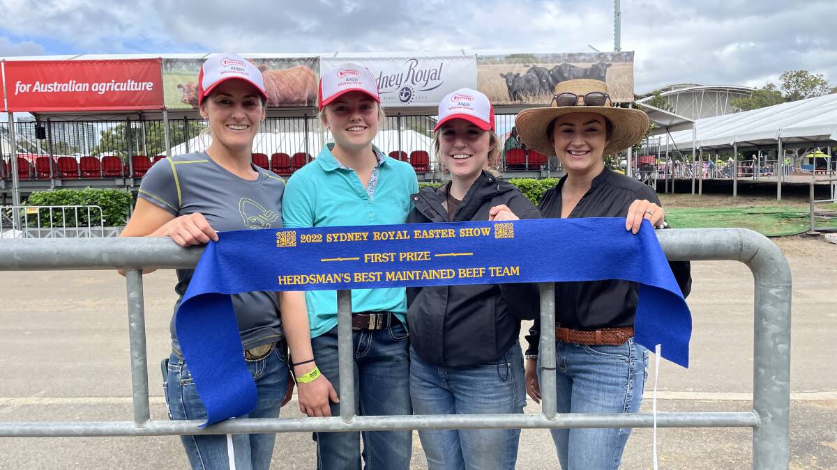 Tattykeel Angus cattle manager Rachael Wheeler with some of her show team, Jasmine Kay, Keiley Brandl and Monique McKinnon with their ribbon for herdsman's best maintained team at Sydney Royal Show.