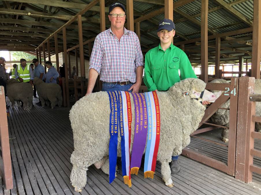 Sheep of the show, a Merino ram sired by a Laraben poll, with Paul and Bateson Pittman, Glenburnie Stud at Walcha.