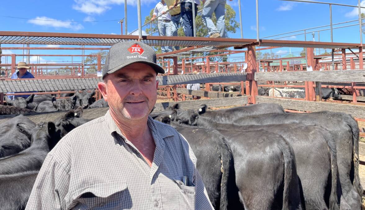 Bruce Pethers, Woodenbong, with Eaglehawk-blood Angus heifers judged champion of the yarding which made 300c/kg for 282kg or $846, going back to the paddock as breeders.