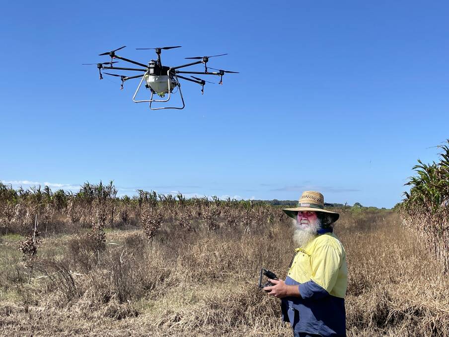 After floods on the far North Coast Shane Moylan's 52kg payload drone made short work of spraying needy macadamia trees while the soil was saturated.