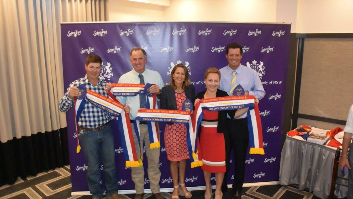 Brett Ellem, Yulgilbar Santa Gertrudis, Ben and Wendy Mayne, Texas Angus with Kate and Lachlan James, Wallawong Premium Beef and their championship ribbons, presented on Friday night at Tamworth as part of the 2018 Sydney Royal Beef challenge.