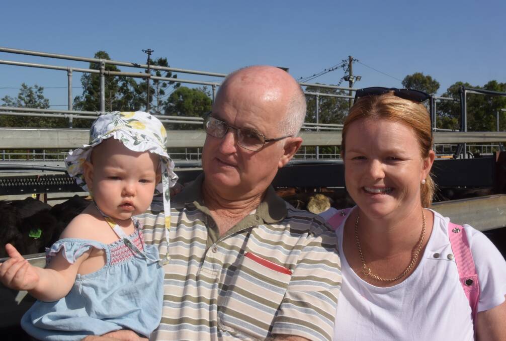 Bullock grazier Ross Lawson, Ulmarra, with his daughter Tracey and granddaughter Winnie.