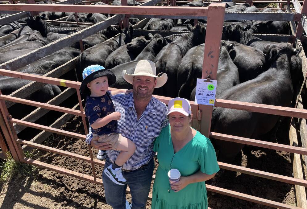 Andrew, Ellie and their son Jamie Hill, Woodenbong, with their heaviest pen of champion steers, European Union-accredited with Inglebrae and Eaglehawk blood, 369kg making 360c/kg or $1328 a head to top the sale at Stanthorpe, Qld, on Friday.