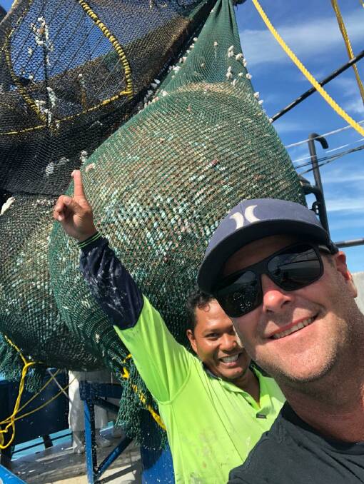 Raptis Pearl skipper Mick McGillivray, with one of his deckhands, celebrated the best start to the banana prawn season in the Gulf of Carpentaria since 1974.