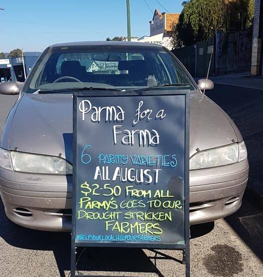 The August campaign “Parma for a Farma” is being promoted by numerous pubs, all keen to share proceeds of their profit from a plate of batter coated chook breast topped in tasty sauce.