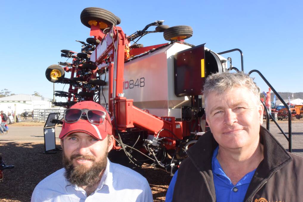 Leigh Dugan from Bourgault with Pomany Angus manager George Spring, looking over the new Canadian built Bourgault LD 848 air seeder on display at Agquip and will be again at Henty field days next week.
